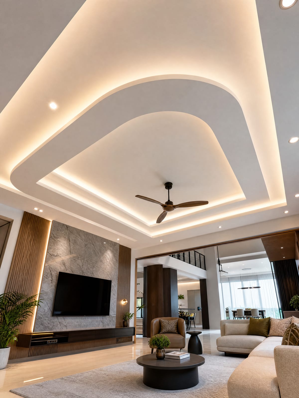 Modern tray plaster ceiling design Multi-level tray plaster ceiling design with integrated cove lighting in a modern living room
