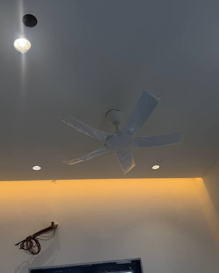 Upper-floor plaster ceiling with curtain box cove lighting recess, recessed downlights and new ceiling fan installation, Klang residence