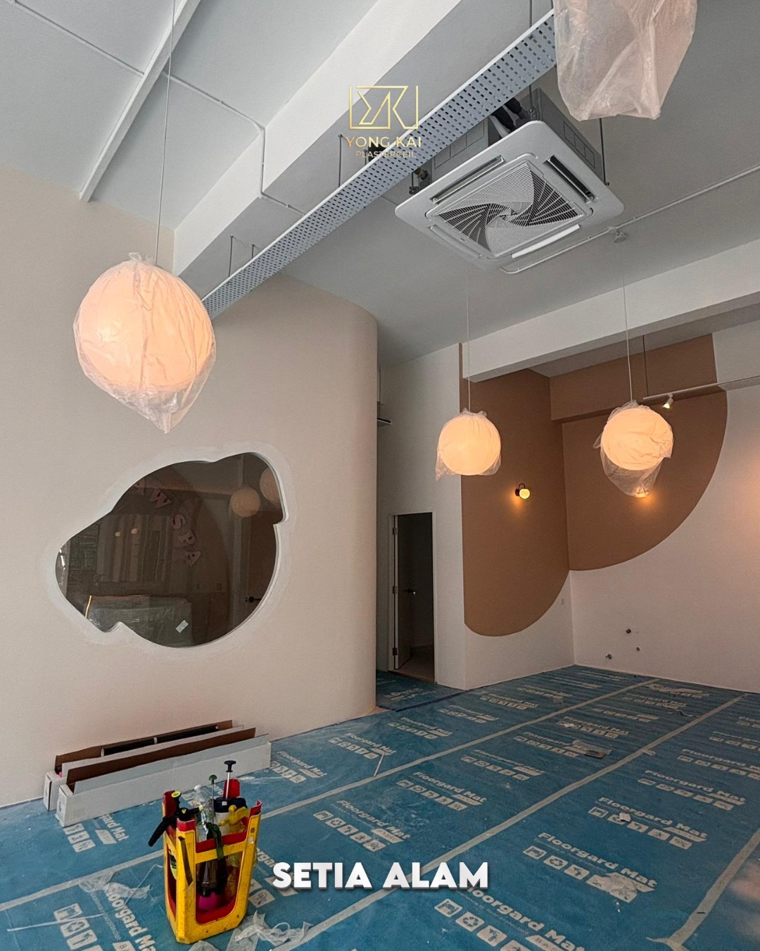 High-ceiling layout with exposed ducting Setia Alam Paw Spa fit-out — high-ceiling layout with exposed ducting and pendant lighting