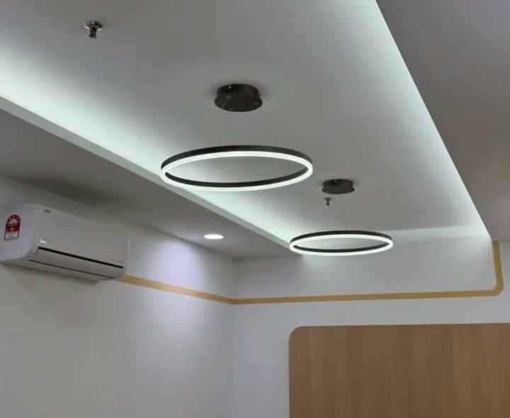 Meeting room plaster ceiling with a cove-lit edge and ring pendant lights, Shah Alam office
